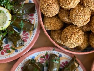 Levant buffet close up of falafels and vine leaf rolls
